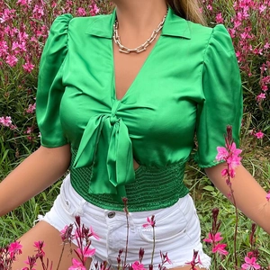 Short puff sleeve satin blouse in green with V-neck bow tie and elastic waist for women