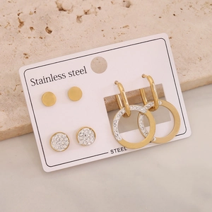 Set of 3 pairs stainless steel gold earrings featuring stud and hoop designs