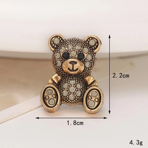 Detailed view of teddy bear shoe charm with 2.2cm height and rhinestone embellishments
