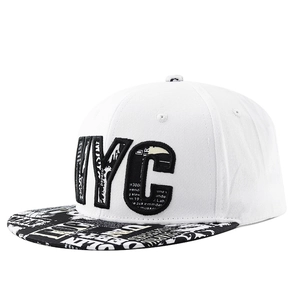 White snapback baseball cap with NYC embroidery and newspaper print on the brim