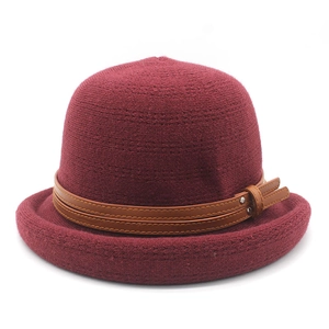 Vintage burgundy knit cloche hat for women with a decorative brown leather buckle strap