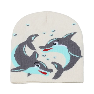 Gros plan du bonnet en tricot avec motif jacquard dauphin bleu et texture douce