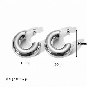 Detailed view of silver hoop earrings showing dimensions 30mm height and 10mm thickness