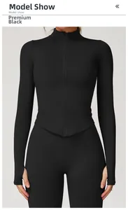 Détail de la veste de yoga noire avec col montant et coupe ajustée en forme de V