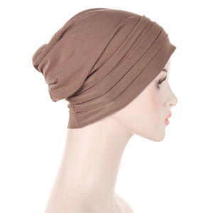 Detail showing soft pleated texture of brown chemotherapy headwear for women