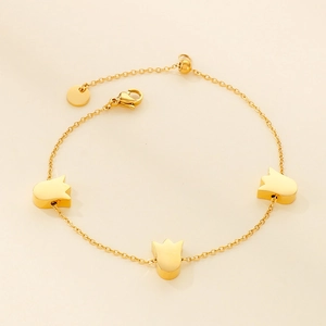 Minimalist gold-plated tulip charm bracelet in stainless steel with adjustable chain links