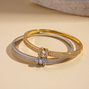 18K gold plated oval buckle bracelet with pave crystals in gold and silver finish