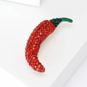 Elegant red chili pepper brooch with sparkling rhinestones and green enamel stem detail