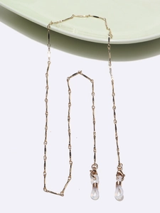 Minimalist gold metal twisted chain eyewear strap with non-slip silicone loops and lobster clasps