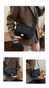 Détail d'un sac bandoulière noir à texture plissée avec fermoir rectangulaire doré chic