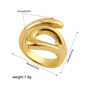 Macro shot of gold abstract wavy ring showing dimensions 22mm by 23mm and 7.8g weight