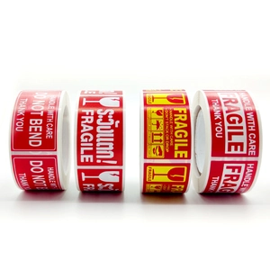 Red and yellow Fragile shipping labels including Handle With Care and Do Not Bend warning stickers