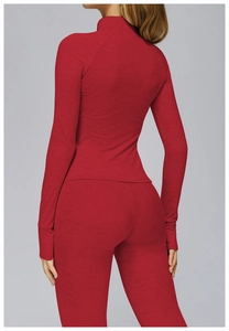 Back view of red long sleeve sports jacket and high waist leggings set with ribbed texture