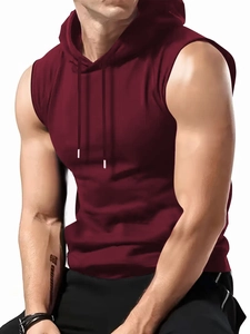 Detail of burgundy sleeveless hoodie for men showing slim fit and muscle definition