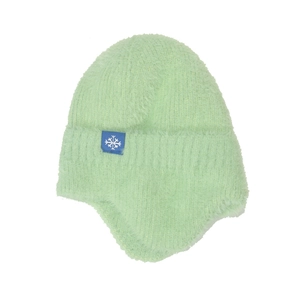 Detail of light green plush knit beanie featuring a blue snowflake tag and ear protection