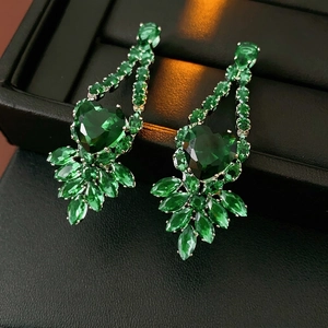 Luxury silver stud earrings with emerald green heart crystals and marquise zircon accents