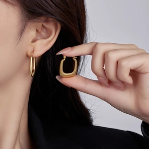 18K gold plated stainless steel hoop earrings with elegant ribbed texture for women