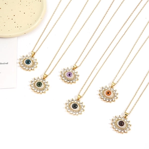 Six gold plated evil eye necklaces with colorful zircon stones in a variety of vibrant colors