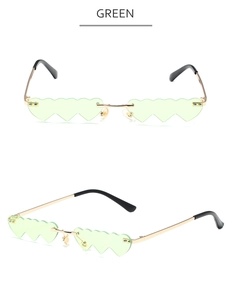 Front and side view of heart-shaped green rimless sunglasses with gold metal temples