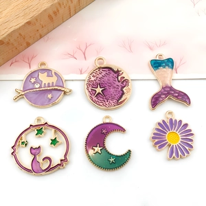Purple enamel pendants set featuring moon star unicorn and daisy designs for jewelry DIY