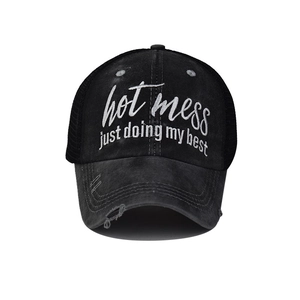 Close-up of vintage charcoal baseball cap with 'hot mess' embroidery and distressed brim