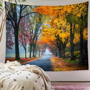 Detail of autumn forest path tapestry hung on a white wall in a modern cozy bedroom