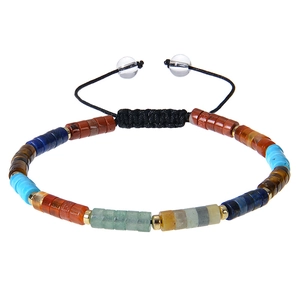 Close-up of bohemian multi-color natural stone beads with golden spacers on adjustable cord