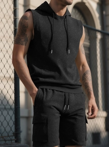 Detail of dark grey marble texture sleeveless hoodie and cargo sports shorts set