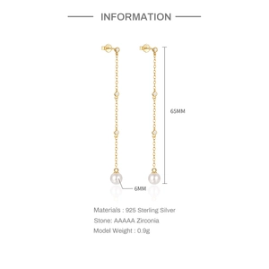 Detail of 925 sterling silver tassel earrings with 6mm pearls and cubic zirconia