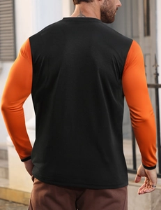 Back view of slim fit long sleeve T-shirt with contrast color stripes and athletic cut
