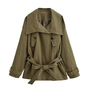Olive green cropped trench coat with sailor collar and waist belt on white background
