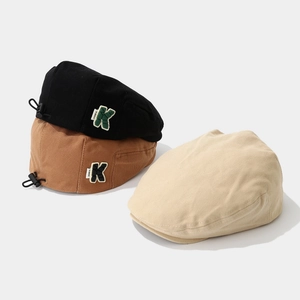 Kids vintage cotton beret hats in black, brown, and beige with letter K embroidery