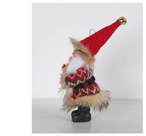 Close-up of a standing Santa doll wearing a knitted ripple sweater and a bell hat