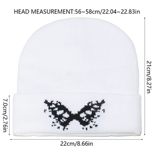 Size chart of white knit beanie featuring butterfly embroidery and 56-58cm circumference
