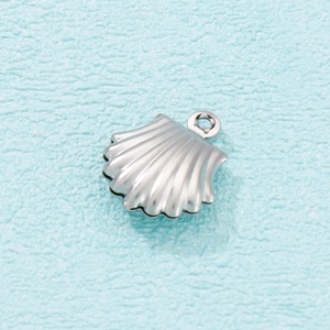 Polished silver stainless steel shell pendant with jump ring on a blue background