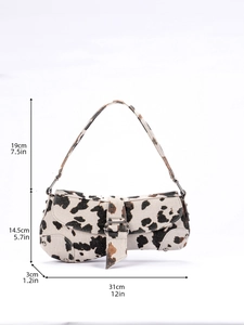 Detailed size chart showing dimensions of cow print saddle shoulder bag in centimeters