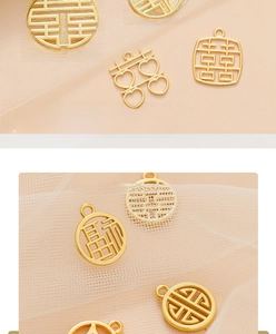Close-up of golden Chinese hollow pendants for DIY wedding gift box decoration