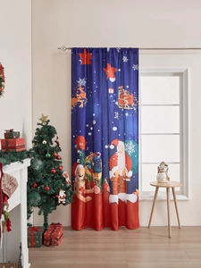 Cozy Christmas room scene with Santa Claus print curtains hanging by a lit fireplace