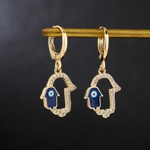Gold Hamsa Hand earrings with blue Evil Eye enamel and sparkling zircon accents
