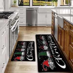 Christmas kitchen mat set with festive gnomes and Merry Christmas print on black background
