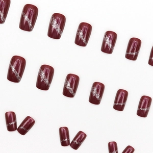 Short square burgundy press-on nails with silver glitter waves and glossy finish