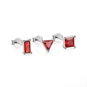 Detailed view of S925 silver stud earrings with red gems in square and triangle shapes