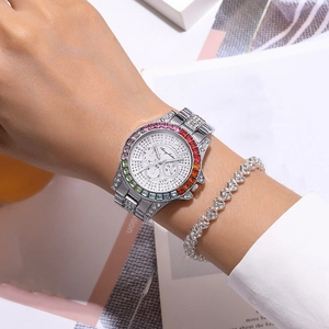 Elegant silver steel watch with rainbow crystal bezel and heart diamond bracelet set