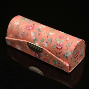 Vintage floral fabric lipstick box with mirror and silver metal clasp in orange pink