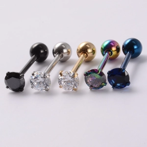 Macro detail of five multi-colored stainless steel tongue rings with 14g zircon settings