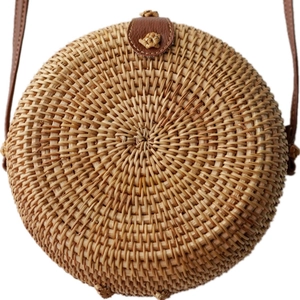 Handmade round rattan crossbody bag with brown leather strap in bohemian holiday style