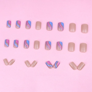 Glossy short square press-on nails with colorful wave patterns on pink background