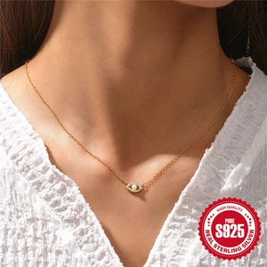925 Sterling Silver Evil Eye Necklace with pearl and cubic zirconia worn on neck