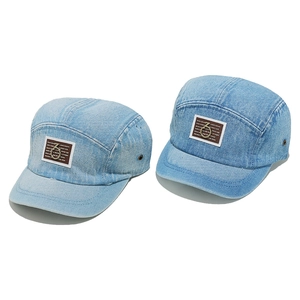 Washed light blue denim 5-panel baseball cap with short brim and patch