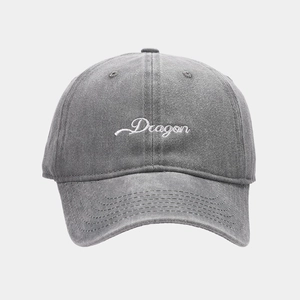 Classic grey washed cotton baseball cap with white Dragon embroidery and curved brim
